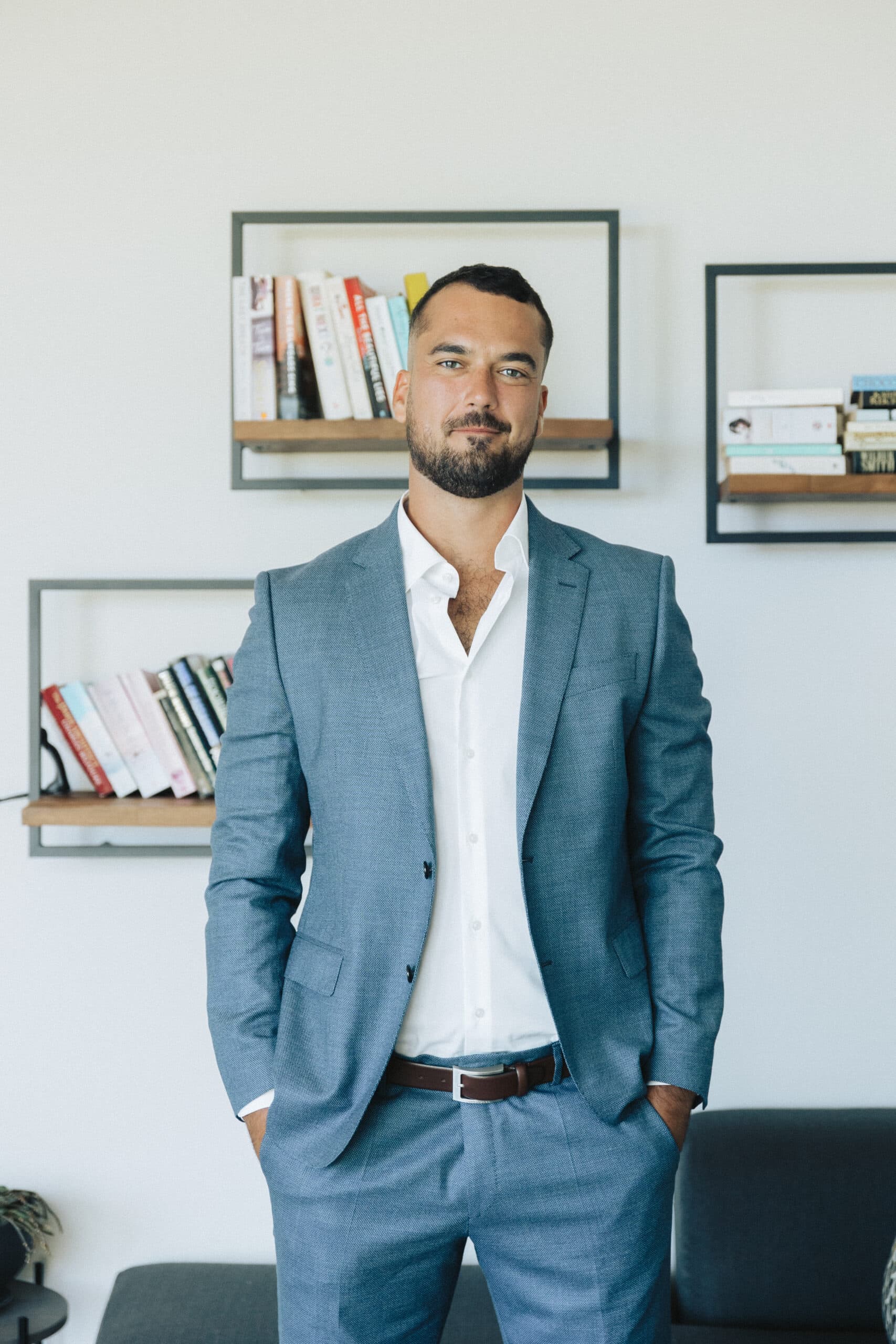 Alan Vey, Co-Founder of Aventus, standing confidently in a modern office