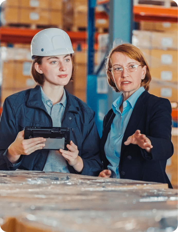 two women talking about work at work